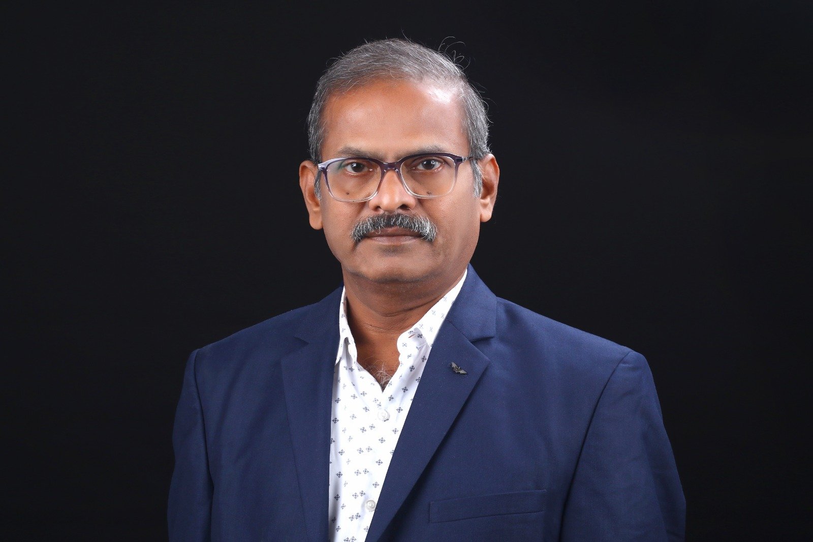 Dr. Raja Munusamy